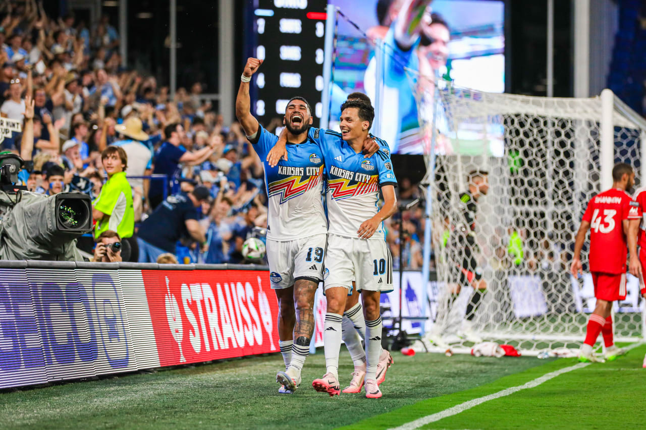 Defender Robert Castellanos (19) and Forward Daniel Salloi (10) celebrate Castellanos goal.