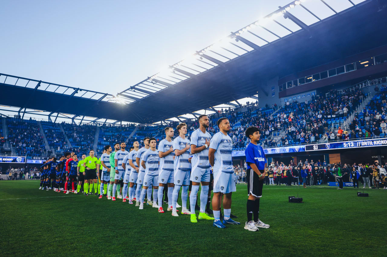Sporting KC stands for the National Anthem before their game vs San Jose