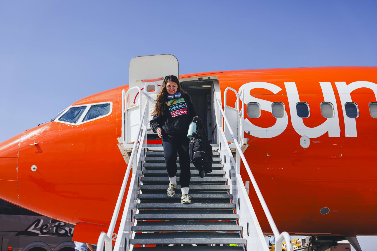 Helen Schmitt departs the SKC charter flight in Salt Lake.