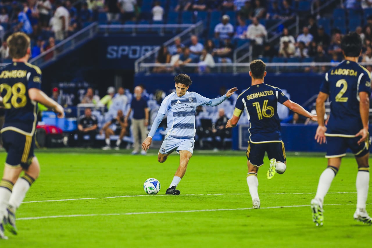 Sporting KC forward Santi Munoz shoots the ball vs Vancouver.