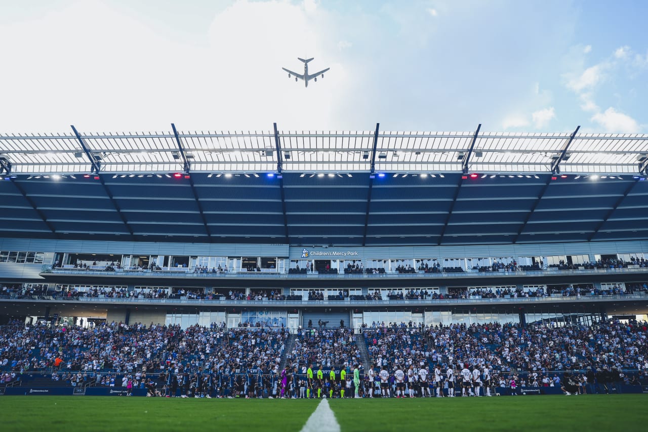 A KC-135 flys over Children's Mercy Park before the start of the game on the 28th.