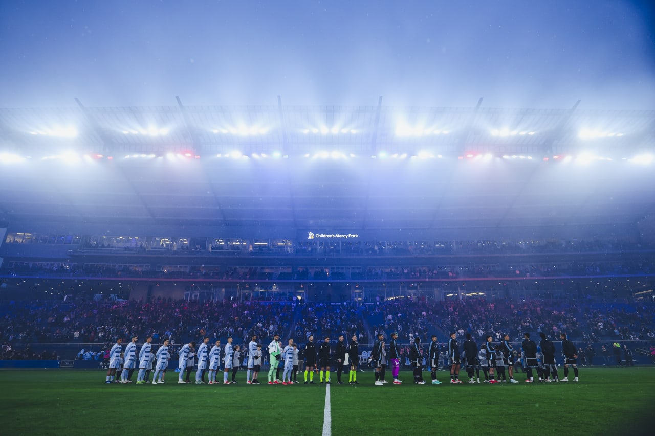 Players stand for the national anthem before the game vs Minnesota.