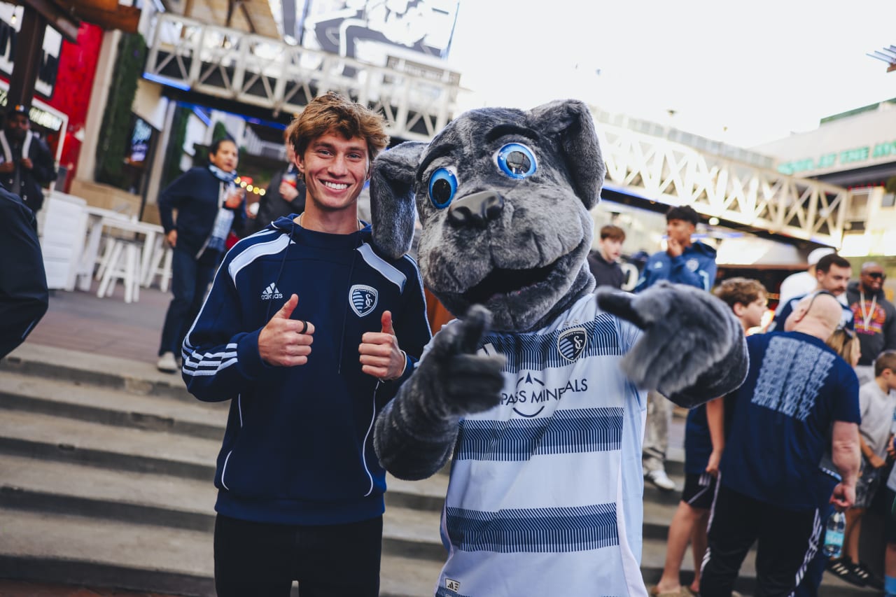 Sporting KC midfielder Jacob Bartlett poses with Blue after the 2025 Block Party