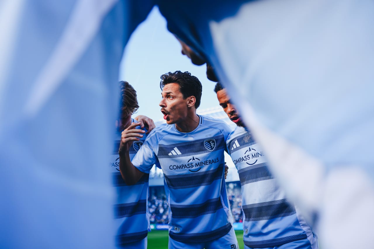 Sporting KC captain Daniel Salloi talks to the team during their huddle pregame.