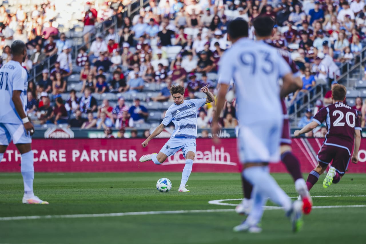 Sporting KC midfielder Jacob Bartlett lines up a along pass