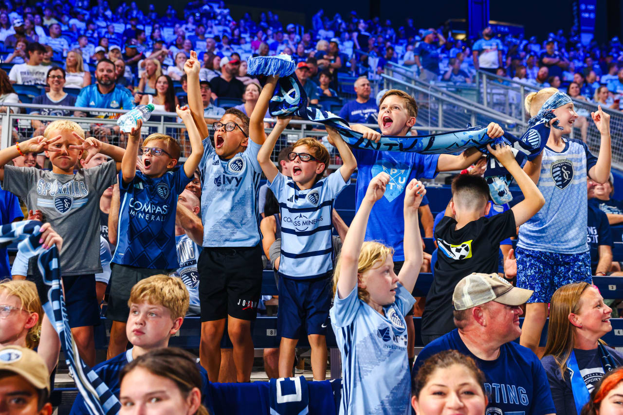 A group of young fans cheer on dKV during the September 21 match against Minnesota United.