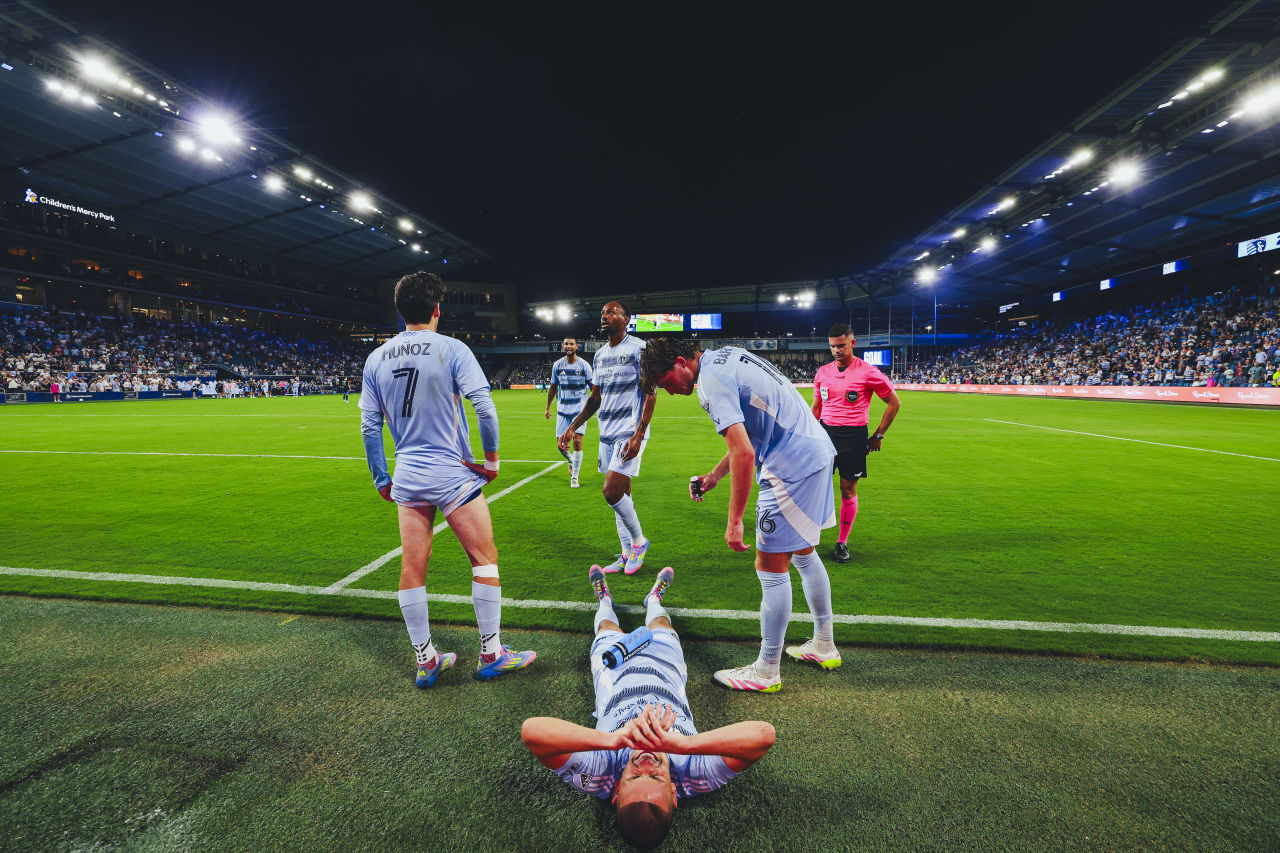 Dejan Joveljić scores against Charlotte FC and his teammates gather around him.