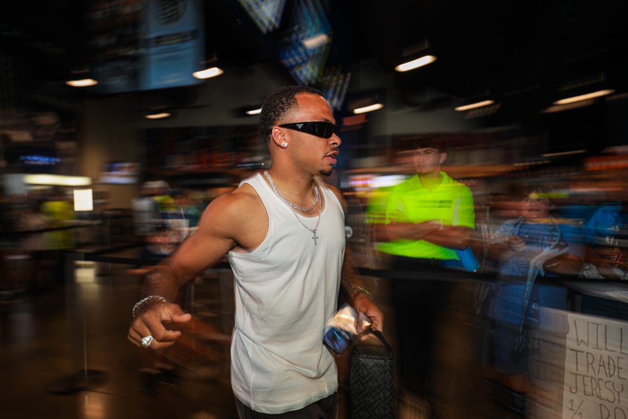 Logan Ndenbe greets supporters in the Budweiser Brewhouse