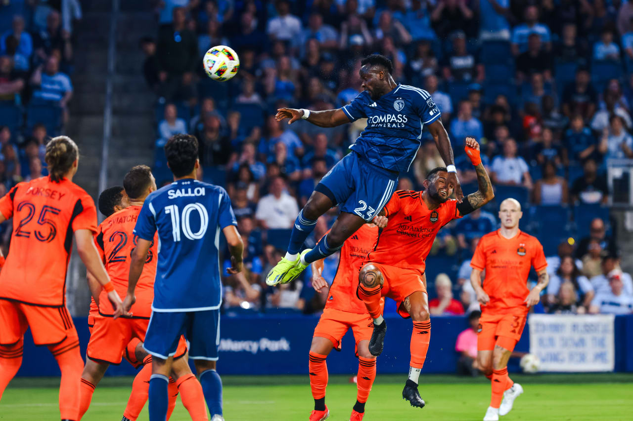 Forward William Agada heads the ball during the May 11 match against Houston Dynamo.