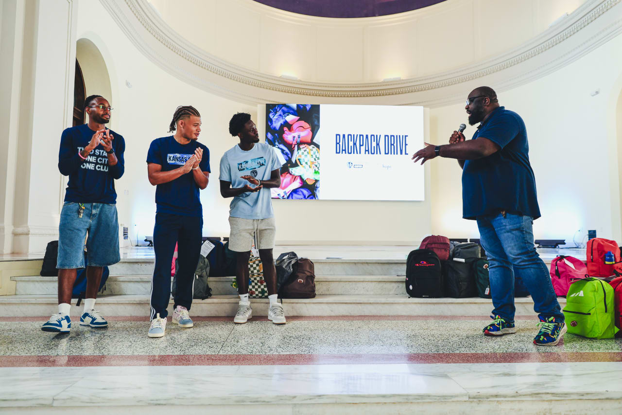 Sporting KC players Mason Toye, Zorhan Bassong and Stephen Afrifa joined Hope Center KC COO Rocky Hodge to deliver the backpacks to students.