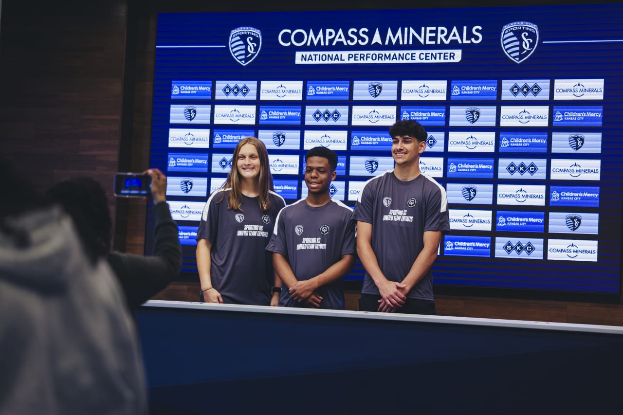 Unfied players Meredith Billings, Makhai Ezell, and Martin Guerra stand for a photo in the press room