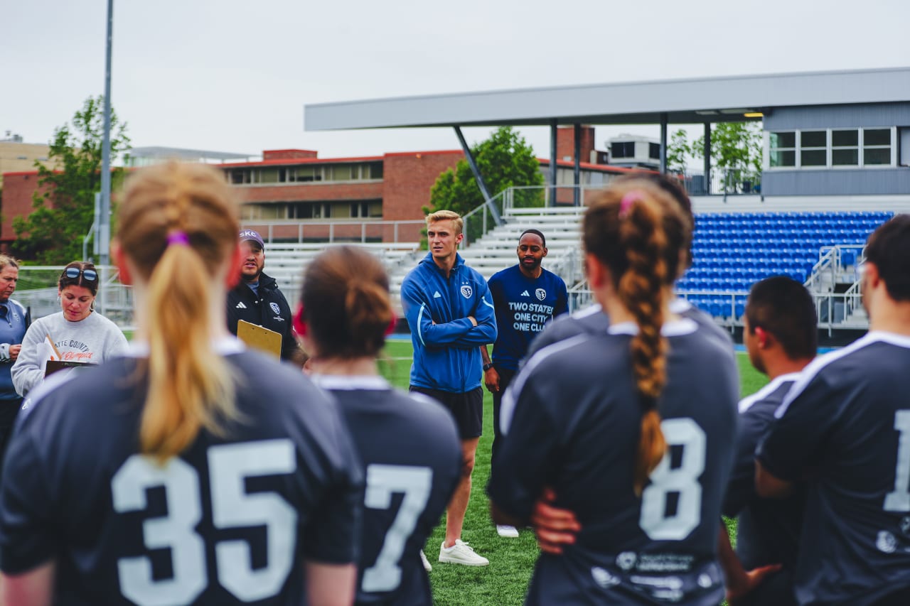 Team Ambassadors Ryan Schewe and Mason Toye talk to the players at Unified Tryouts on April 27.