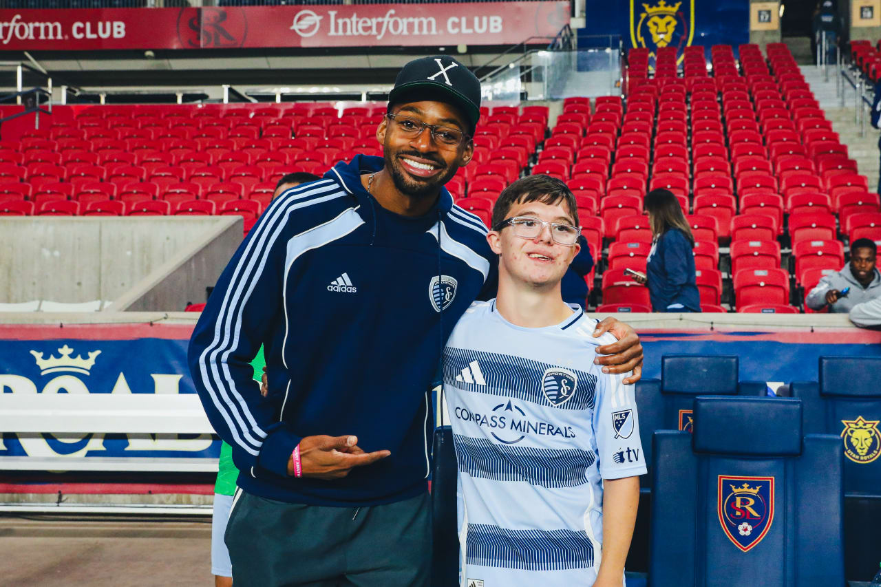Sporting KC forward Mason Toye takes a photo with Chase Hitchcock after the Unified game vs RSL.