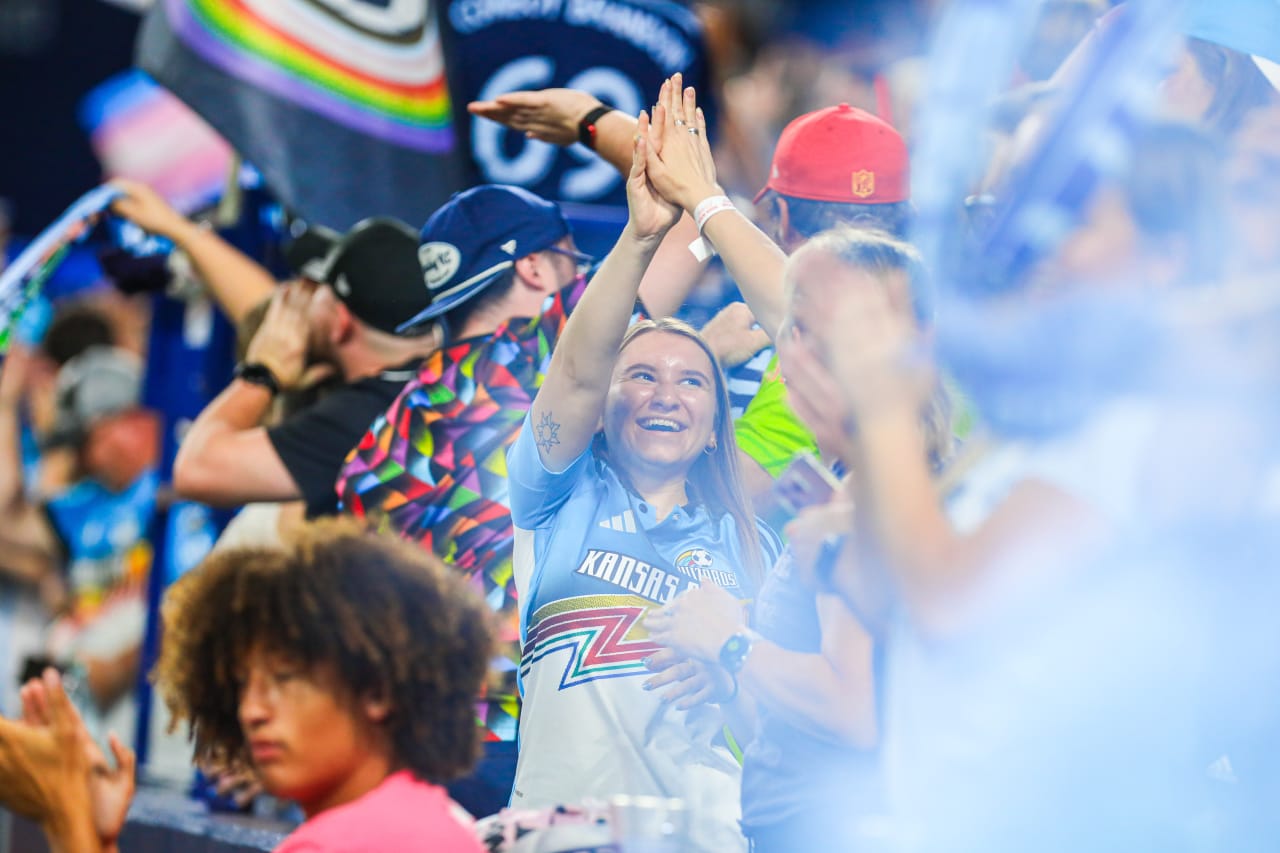 Fans high-five after a goal during the Sept. 18 match against Colorado Rapids at Children's Mercy Park.