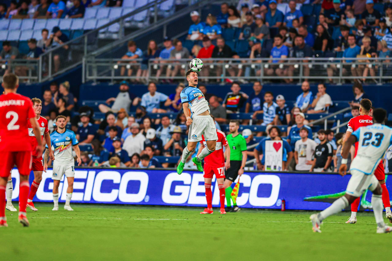 Midfielder Nemanja Radoja leaps in the air to get the header during the Jul. 28 match.