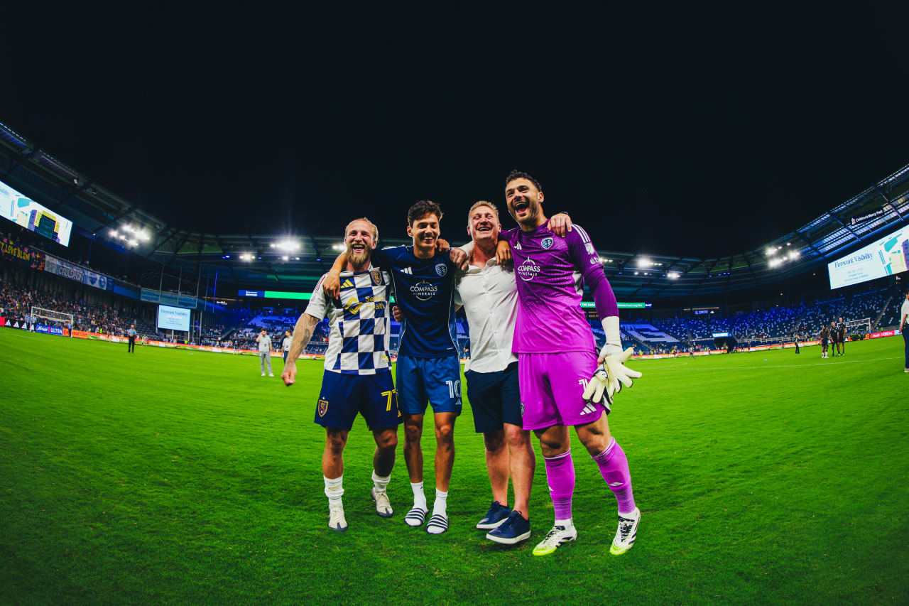 Real Salt Lake forward Johnny Russell, Sporting KC forward Daniel Salloi, former Sporting KC goalkeeper Tim Melia, and Sporting KC goalkeeper John Pulskamp smile together after the 1-1 draw on the 28th.