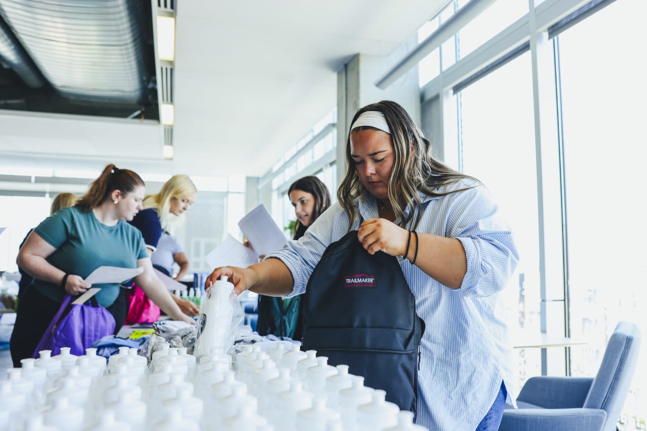 On August 5th, Sporting associates gathered with enthusiasm, ensuring every bag was filled with the right supplies,