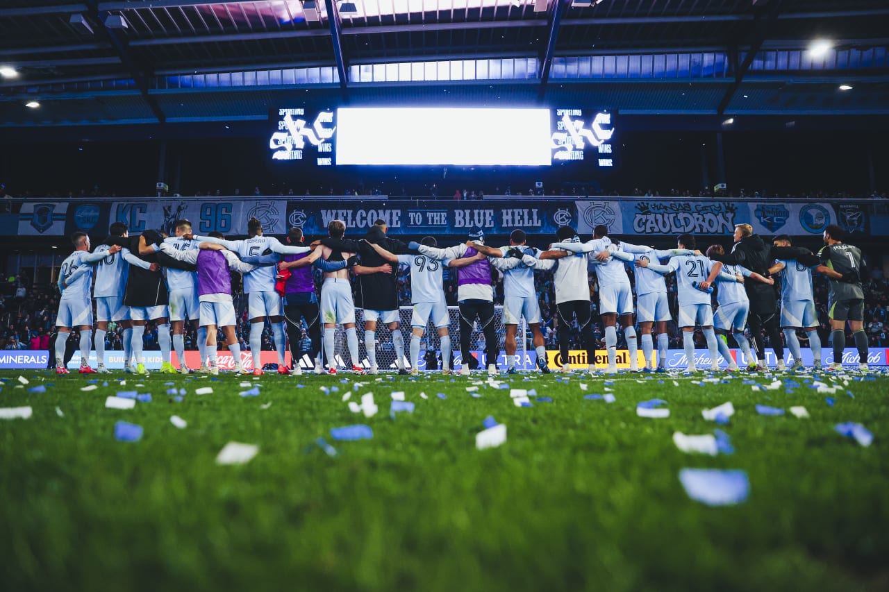 Sporting KC players sway in front of the cauldron after beating St Louis