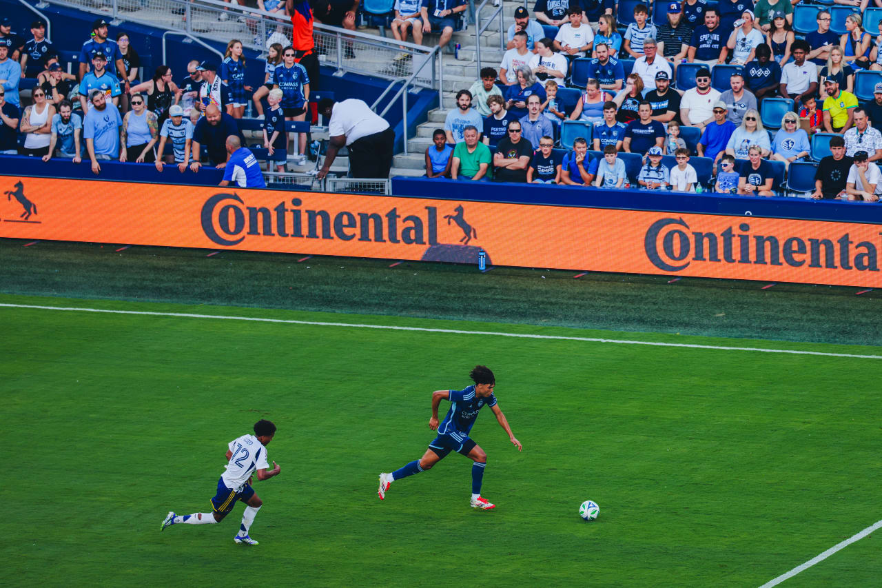 Sporting KC defender Ian James dribbles the ball during his first MLS start