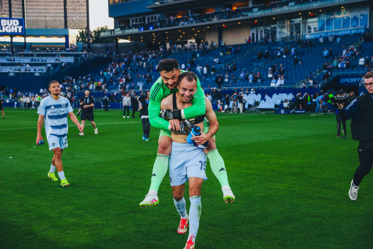 Sporting KC defender Jansen Miller gives a piggy back ride to Goalkeeper John Pulskamp after defeating LA and keeping a clean sheet.