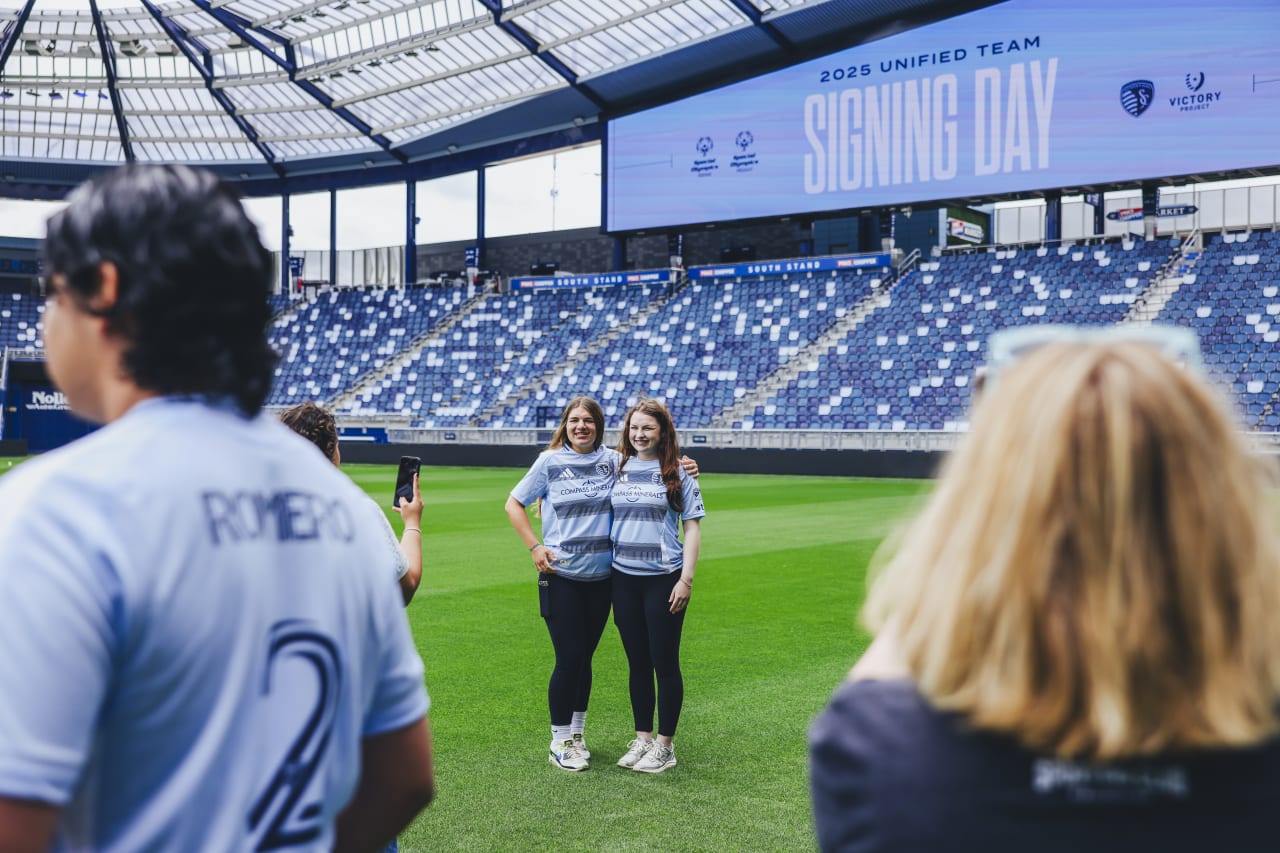 Unified players Helen Schmitt and Hallie Schmitt pose for a photo in Children's Mercy Park