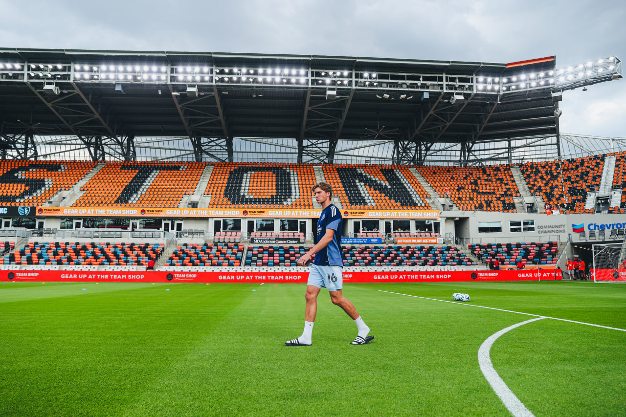 Sporting KC midfielder Jacob Bartlett inspects the field before playing Houston on Saturday