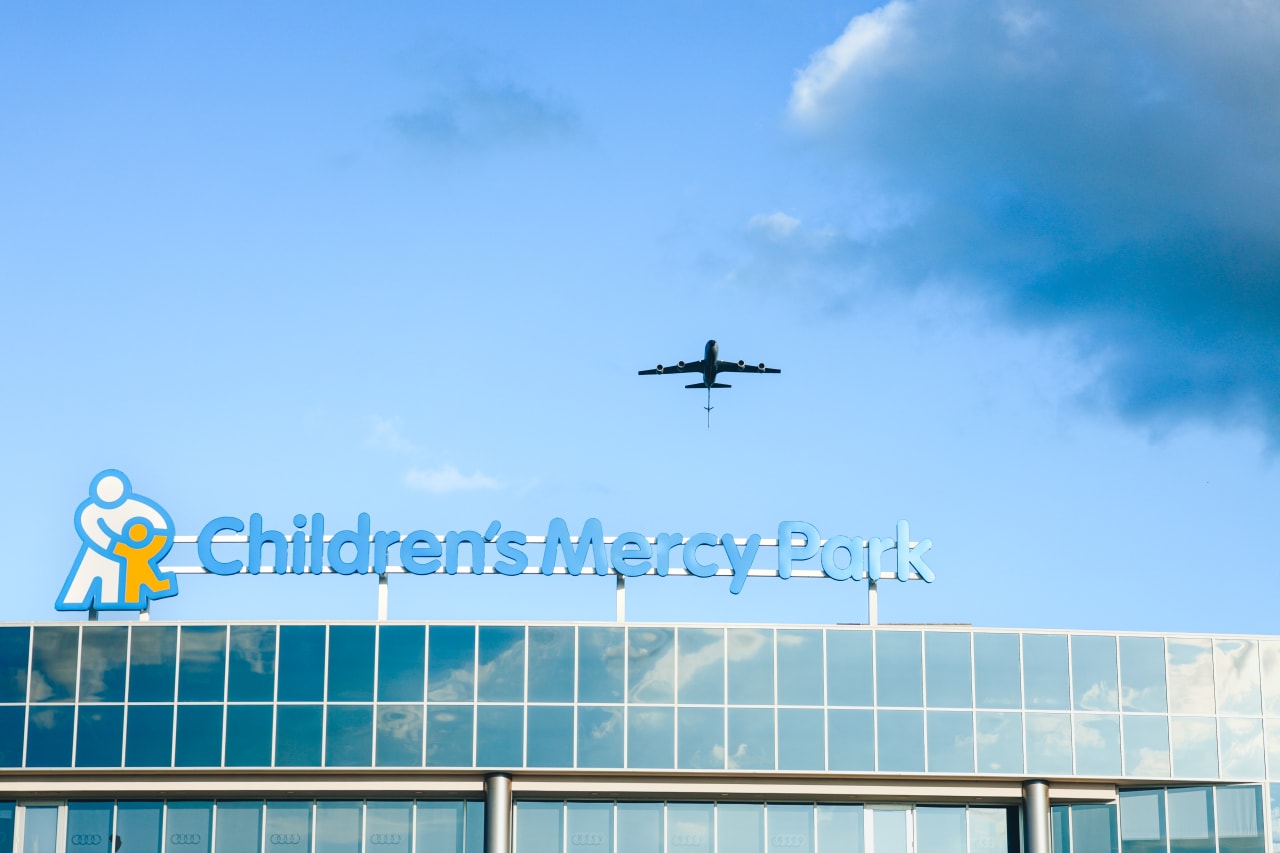 A KC-135 flys over Children's Mercy Park before the start of the game on the 28th.
