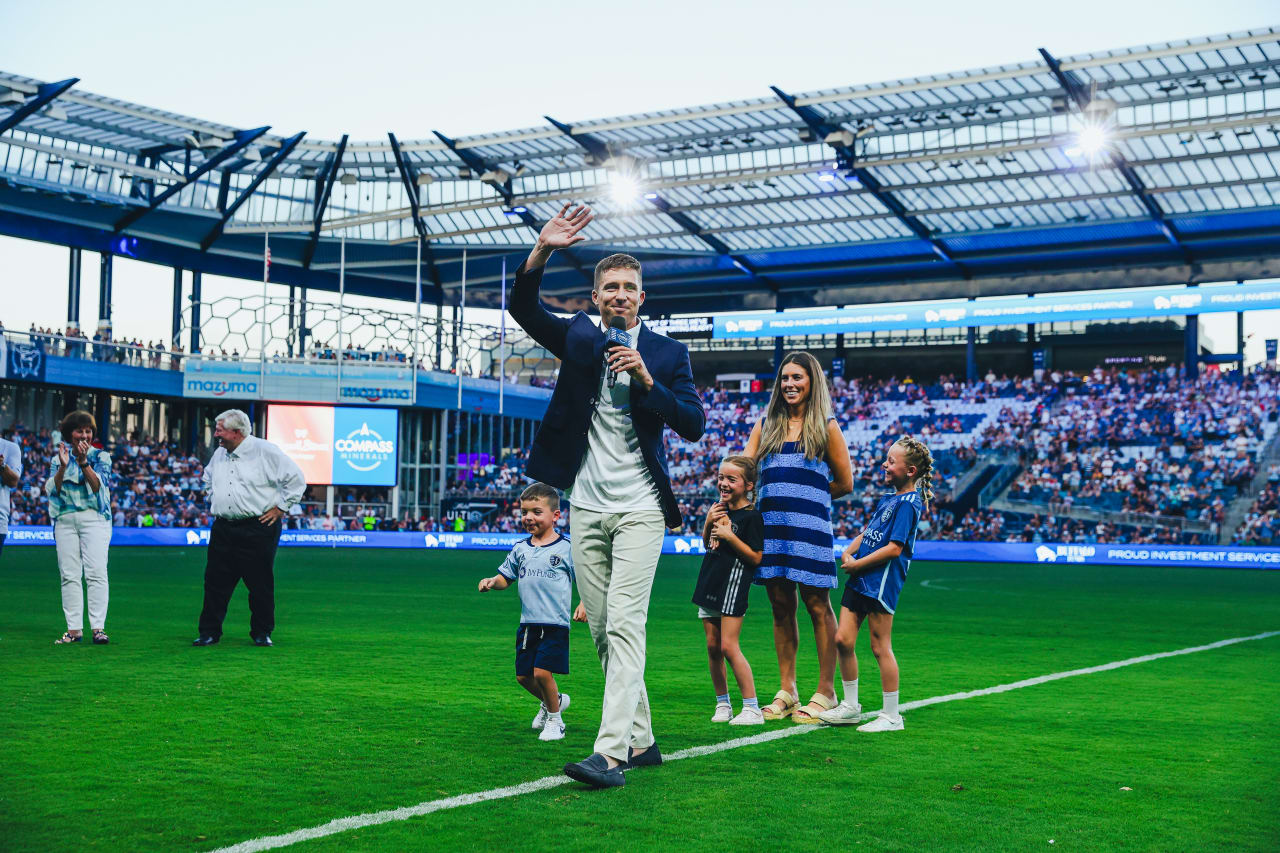 Sporting Legend Matt Besler waves to the fans after being inducted as a Sporting Legend