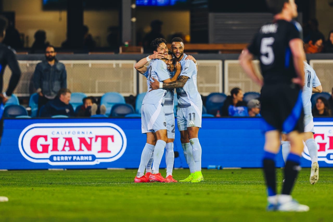 Sporting KC forward Erik Thommy celebrates with teammates Daniel Salloi and Khiry Shelton after scoring his second goal of 2025 vs San Jose