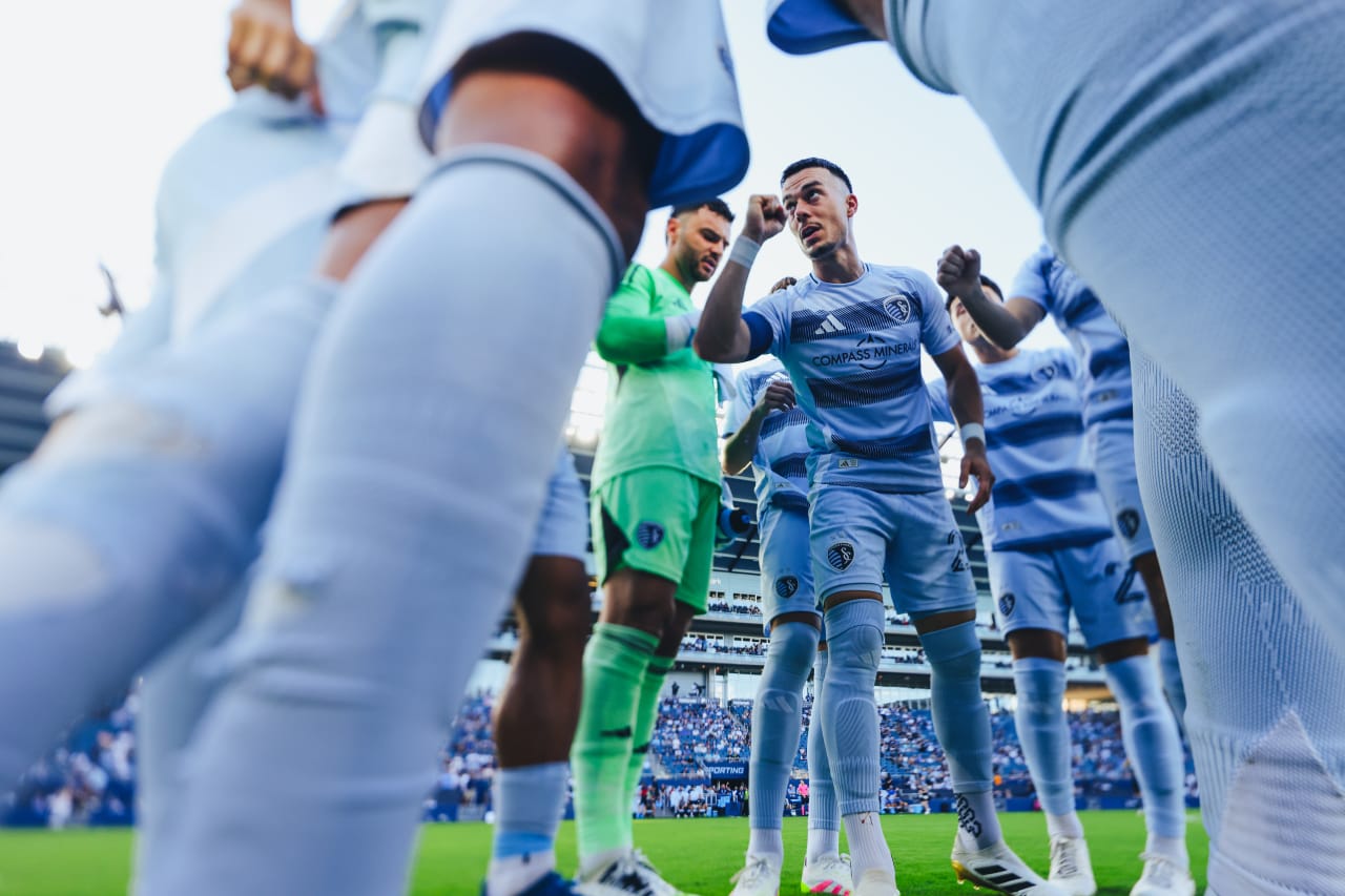 The team huddle led by Captain Erik Thommy on June 25.
