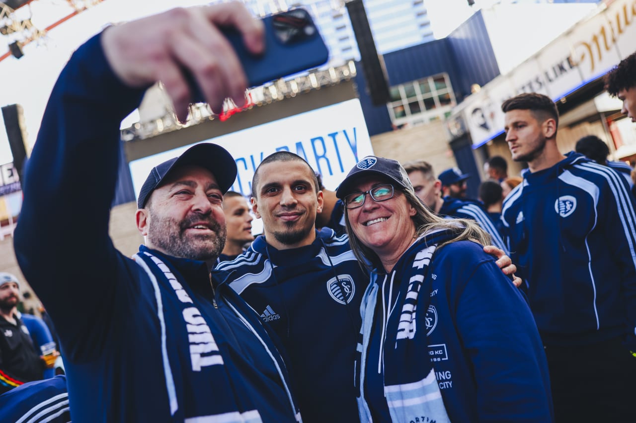 Sporting KC's new winger Shapi Suleymanov takes a selfie with fans