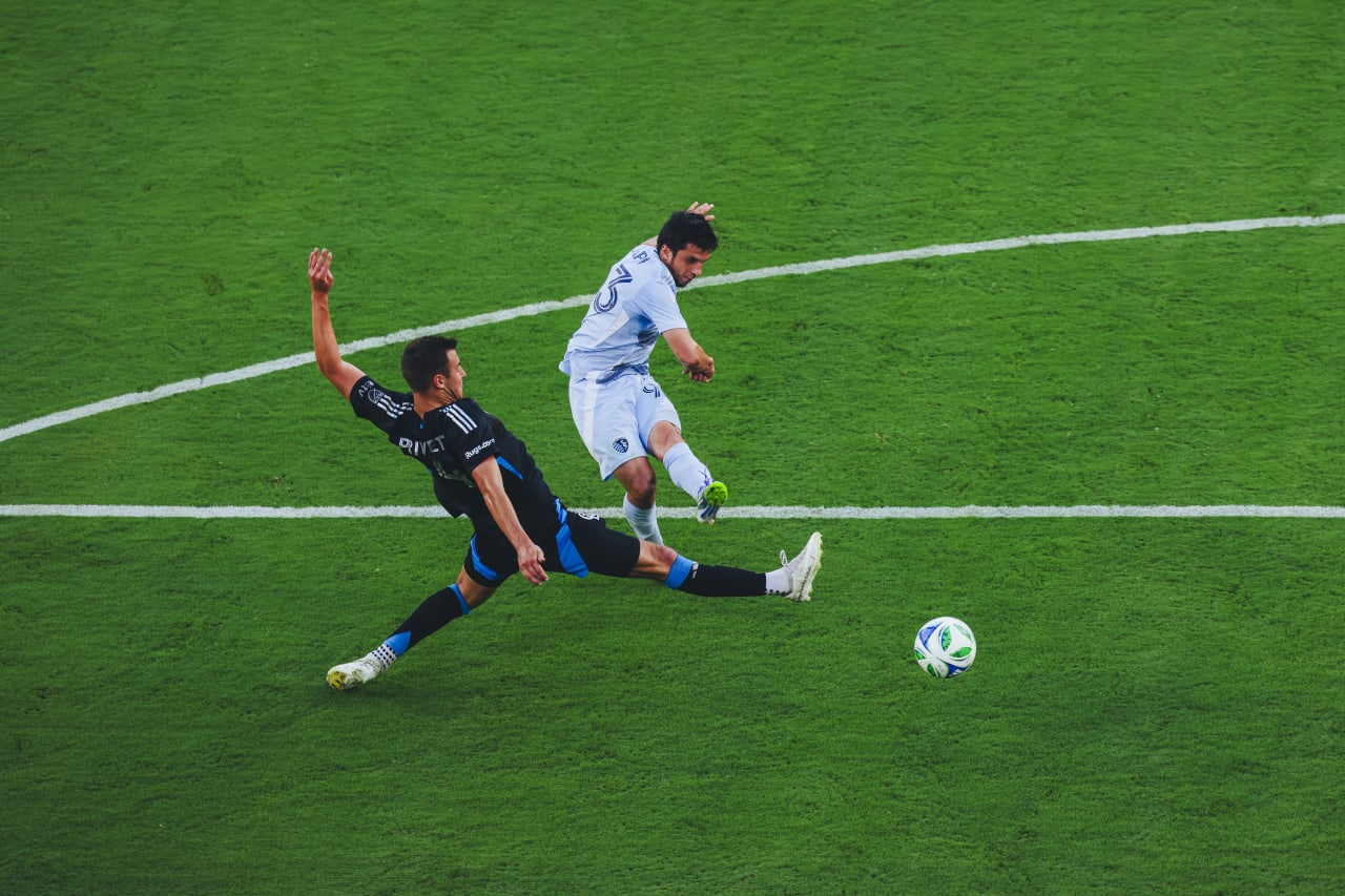 Forward Shapi Suleymanov evades the Charlotte FC defender.