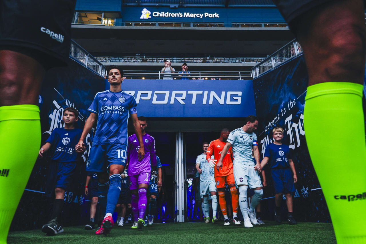Sporting KC and Colorado walk out for the game on the 30th.