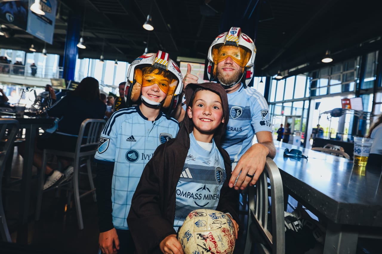 Sporting KC fans pose in their Star Wars accessories before the game on Sunday.