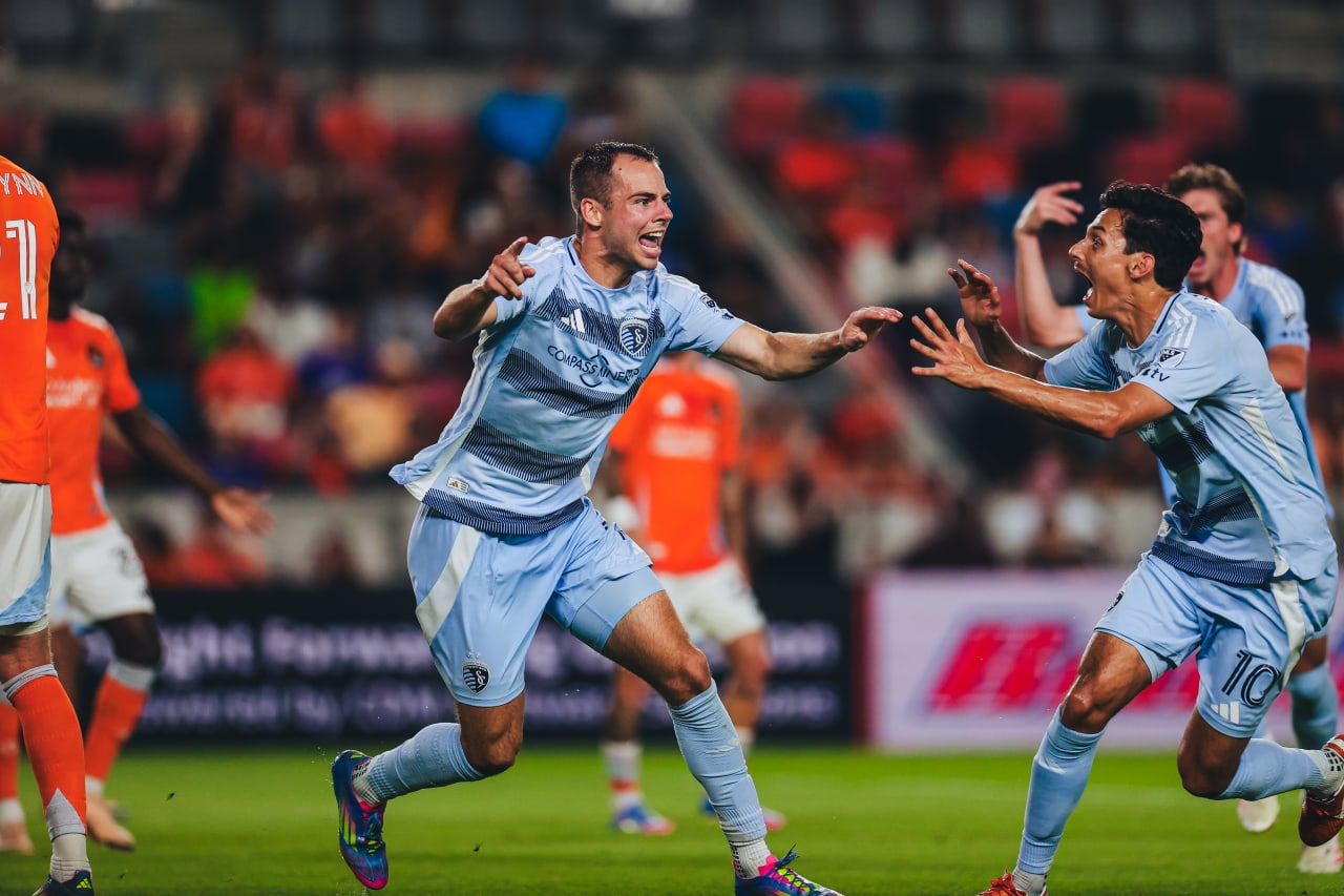 Sporting KC defender Jansen Miller and forward Daniel Salloi celebrate after forward Dejan Joveljic's second goal