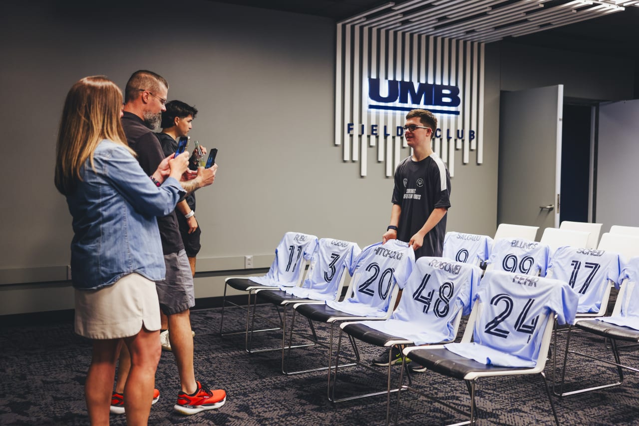 Unified player Chase Hitchcock poses with his jersey on signing day