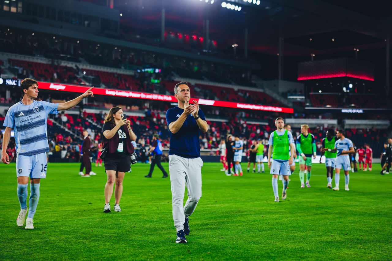 Sporting KC interim head coach Kerry Zavagnin thanks the traveling crowd after the draw vs St. Louis