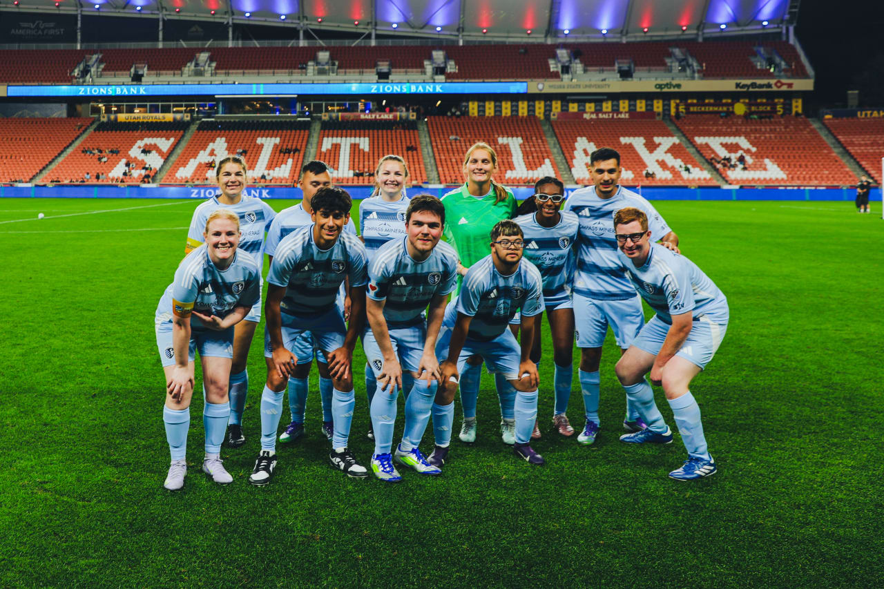 The SKC Unified starting XI pause for a photo before their game.