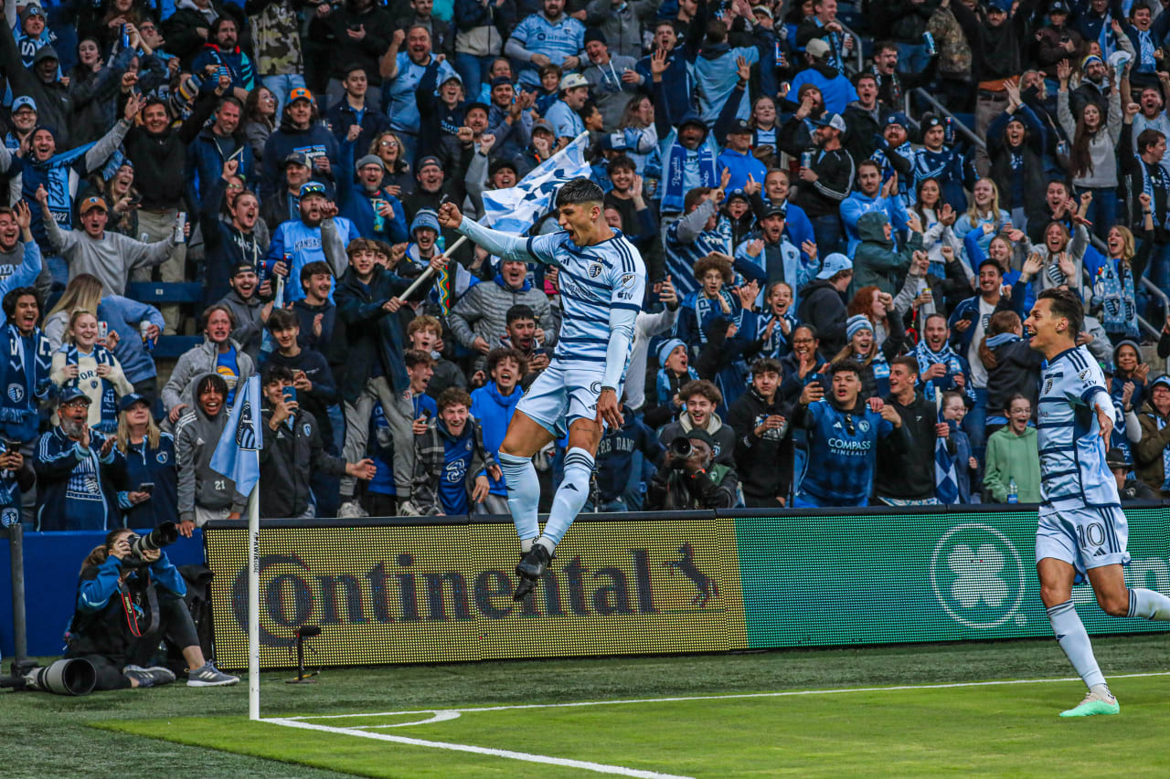 Forward Alan Pulido (9) leaps in the air to celebrate his goal against St. Louis at Children's Mercy Park on April 20, 2024.