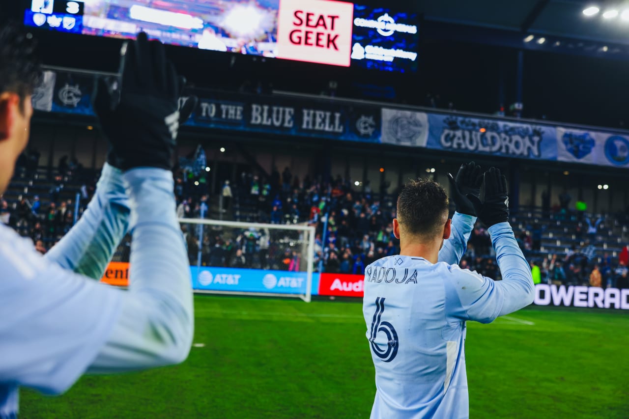 Sporting KC players Nemanja Radoja and Daniel Salloi thank the fans for staying through the blizzard after the game.