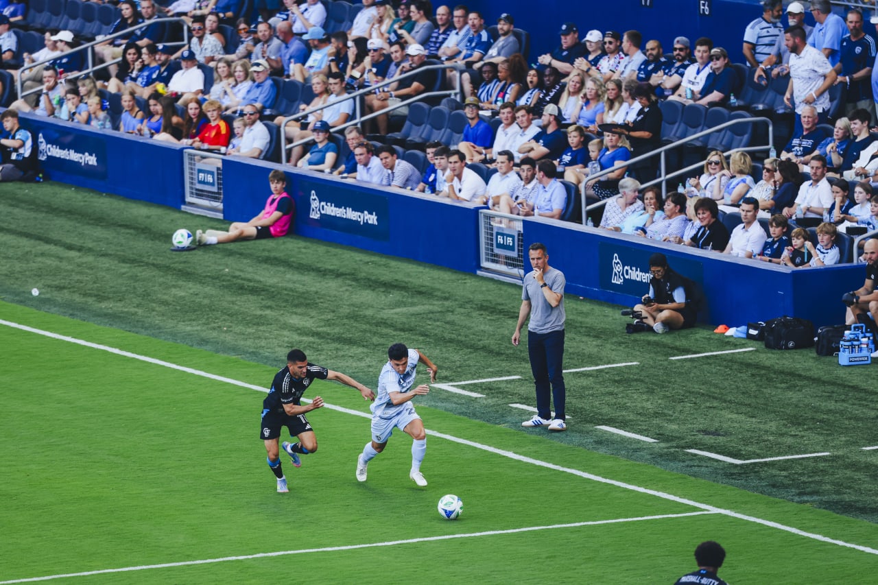 Midfielder Manu García run past Charlotte FC player.
