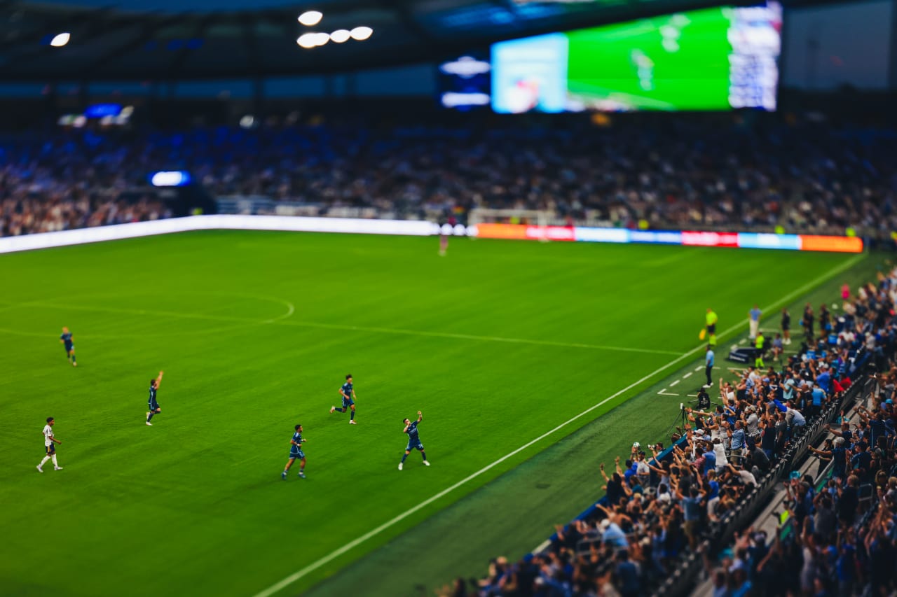 Sporting KC forward Erik Thommy celebrates with his signature "bow and arrow" celebration after his goal vs Real Salt Lake