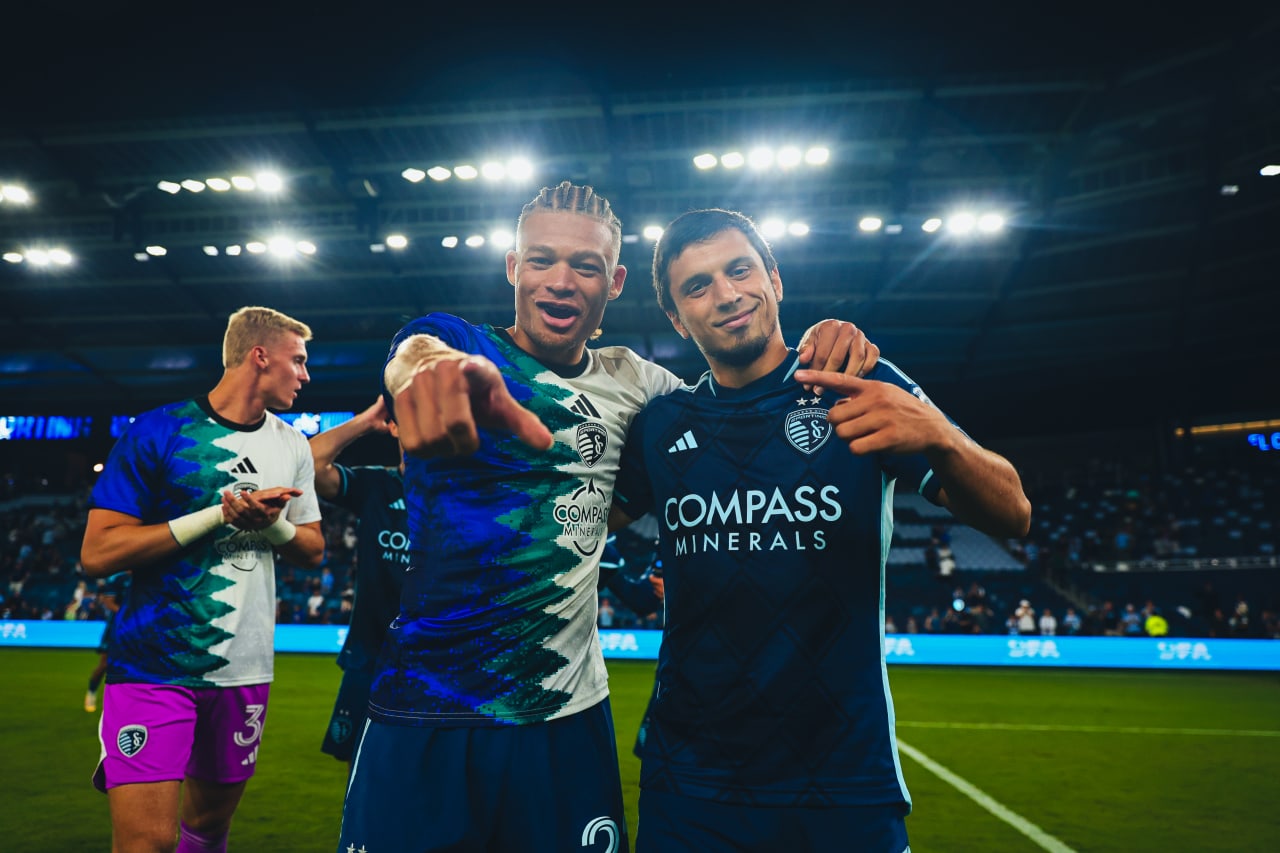 Sporting KC midfielder Zorhan Bassong and Sporting KC forward Shapi Suleymanov pose for the camera after the win against Colorado.