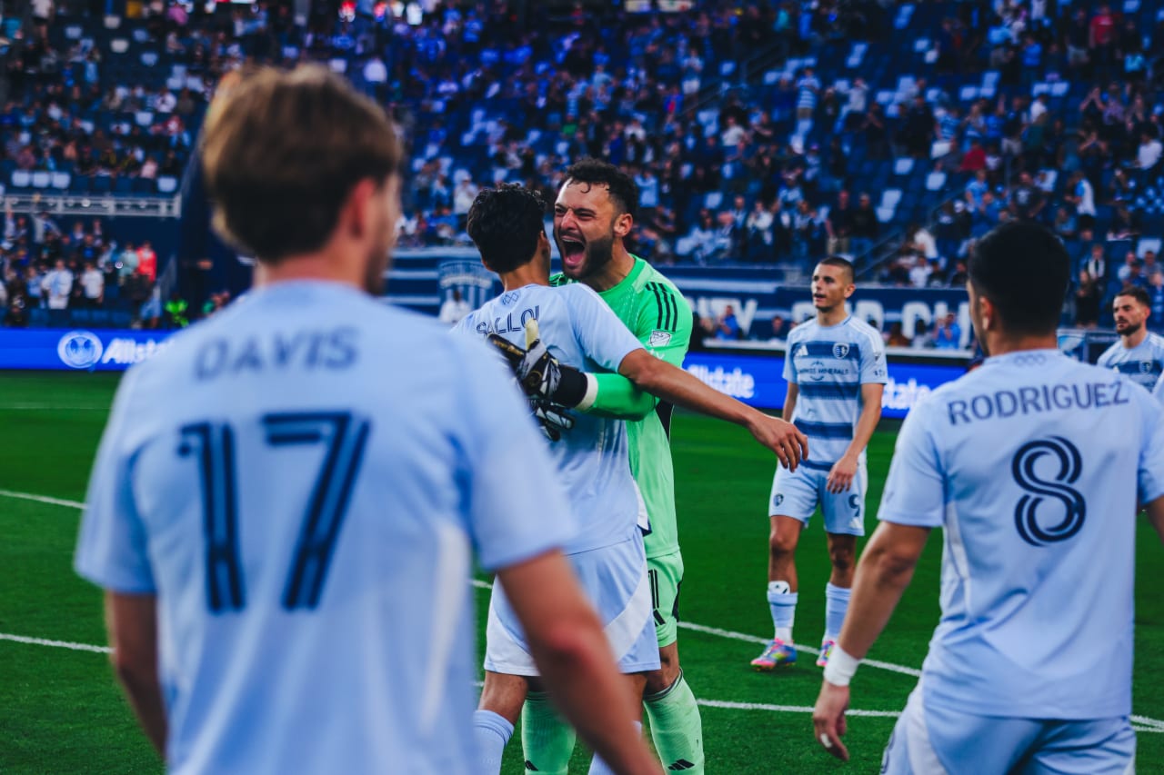 Sporting KC goalkeeper celebrates with Sporting KC forward Daniel Salloi after beating LA 1-0 on Sunday.
