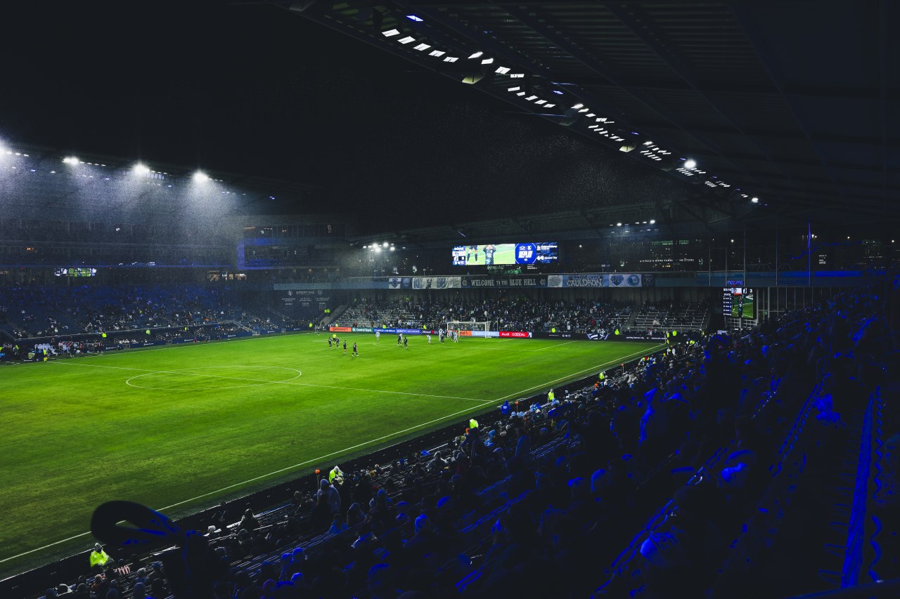 Both teams line up for a Minnesota corner kick as the snow falls heavily.