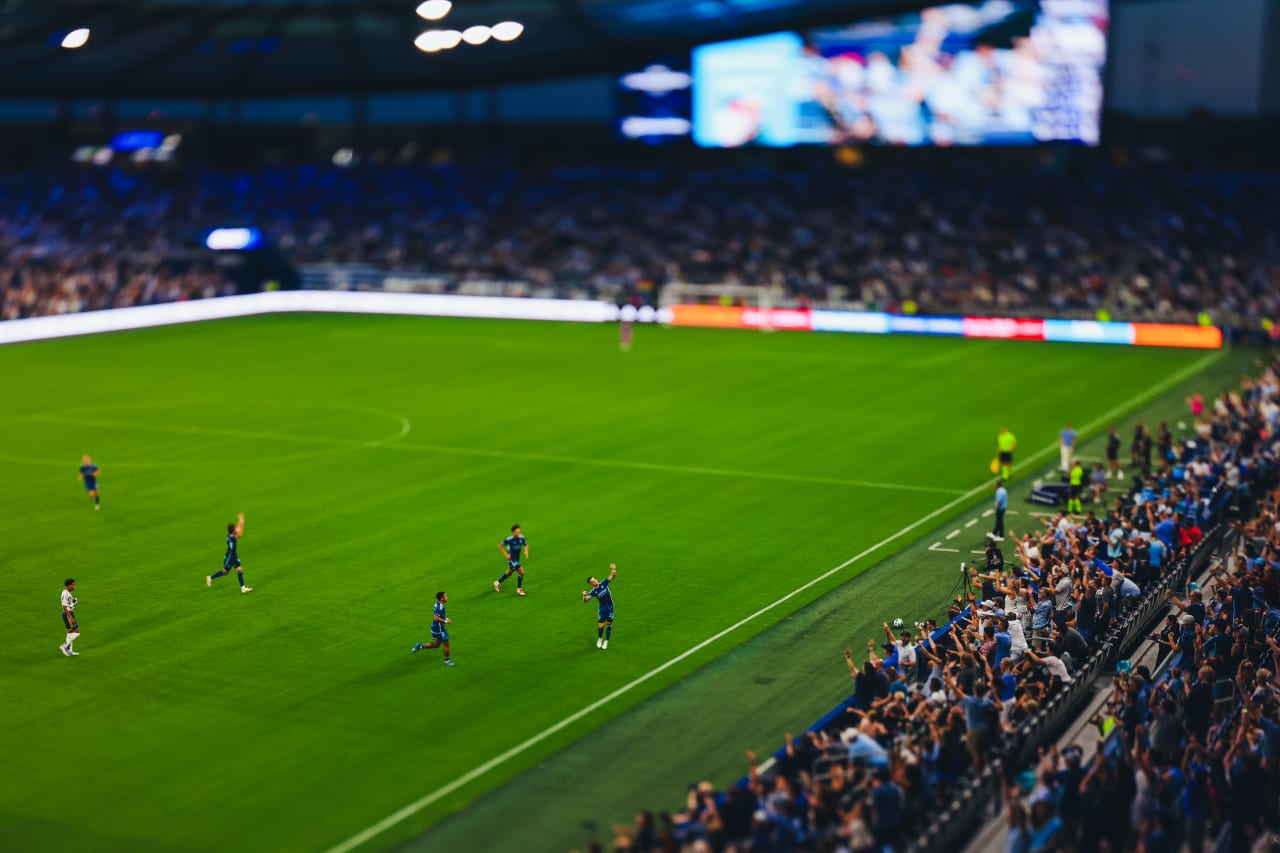 Sporting KC forward Erik Thommy does his signature bow and arrow celebration after scoring vs Real Salt Lake.