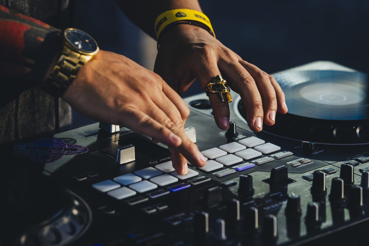 DJ FK Menace mixes before the game vs Vancouver.